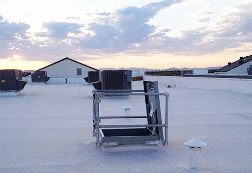 A view of the roof of the Legacy Traditional Charter School, showcasing a Personnel Roof Hatch.