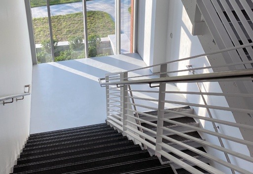 An above view of a staircase displaying the use of the Nystrom product, Renovation Nosing with EcoTread.